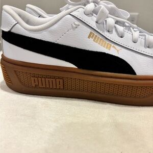 New Puma Tennis Shoes. Womens size 8 1/2.  White leather with black suede.